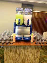 Frozen Cocktail and Slush Machine for Parties with cocktail glasses and straws